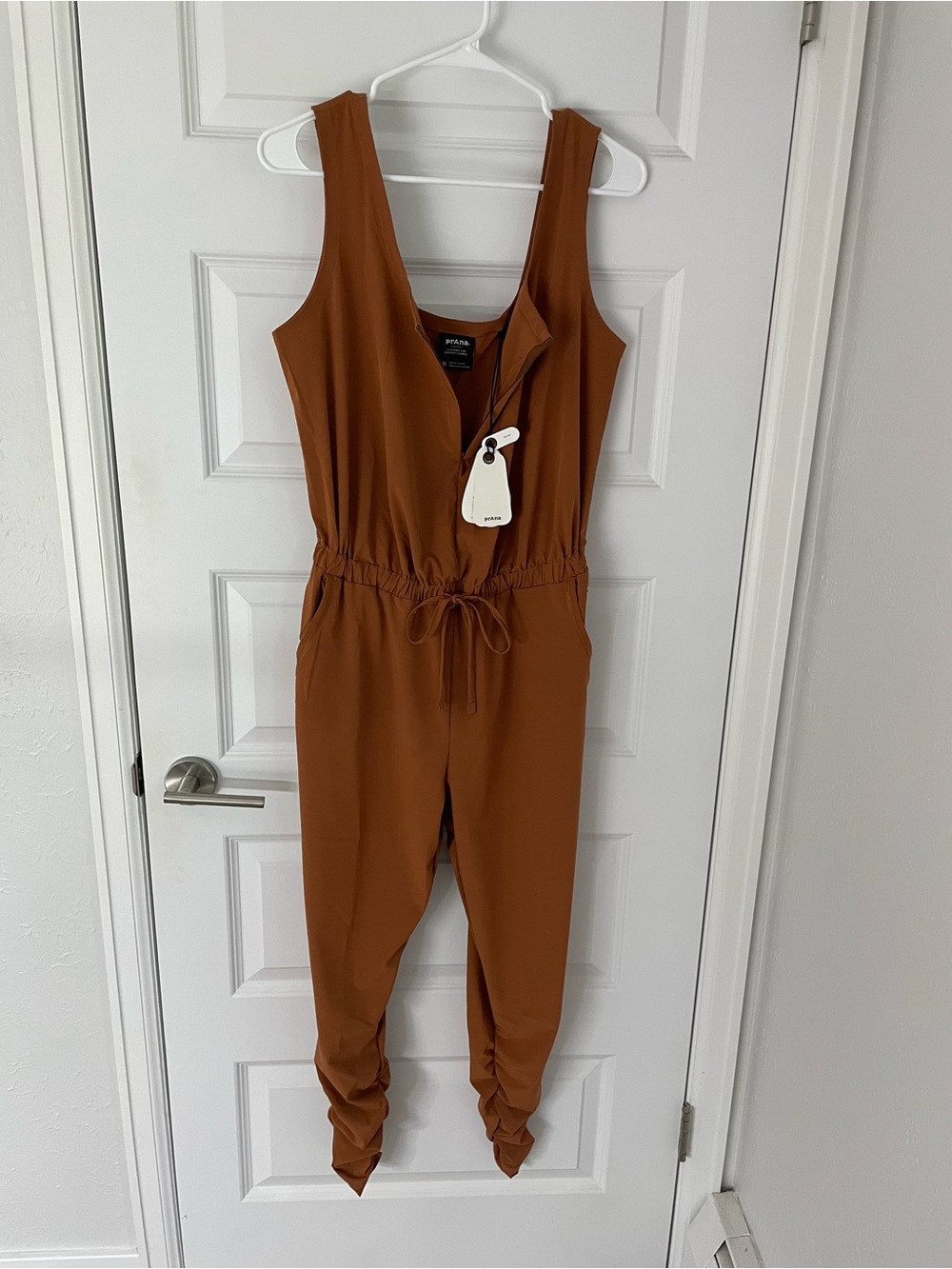 New Prana Railay Jumpsuit Sleeveless Womens M Clay Brown Stretch Ruched Hem NWT
